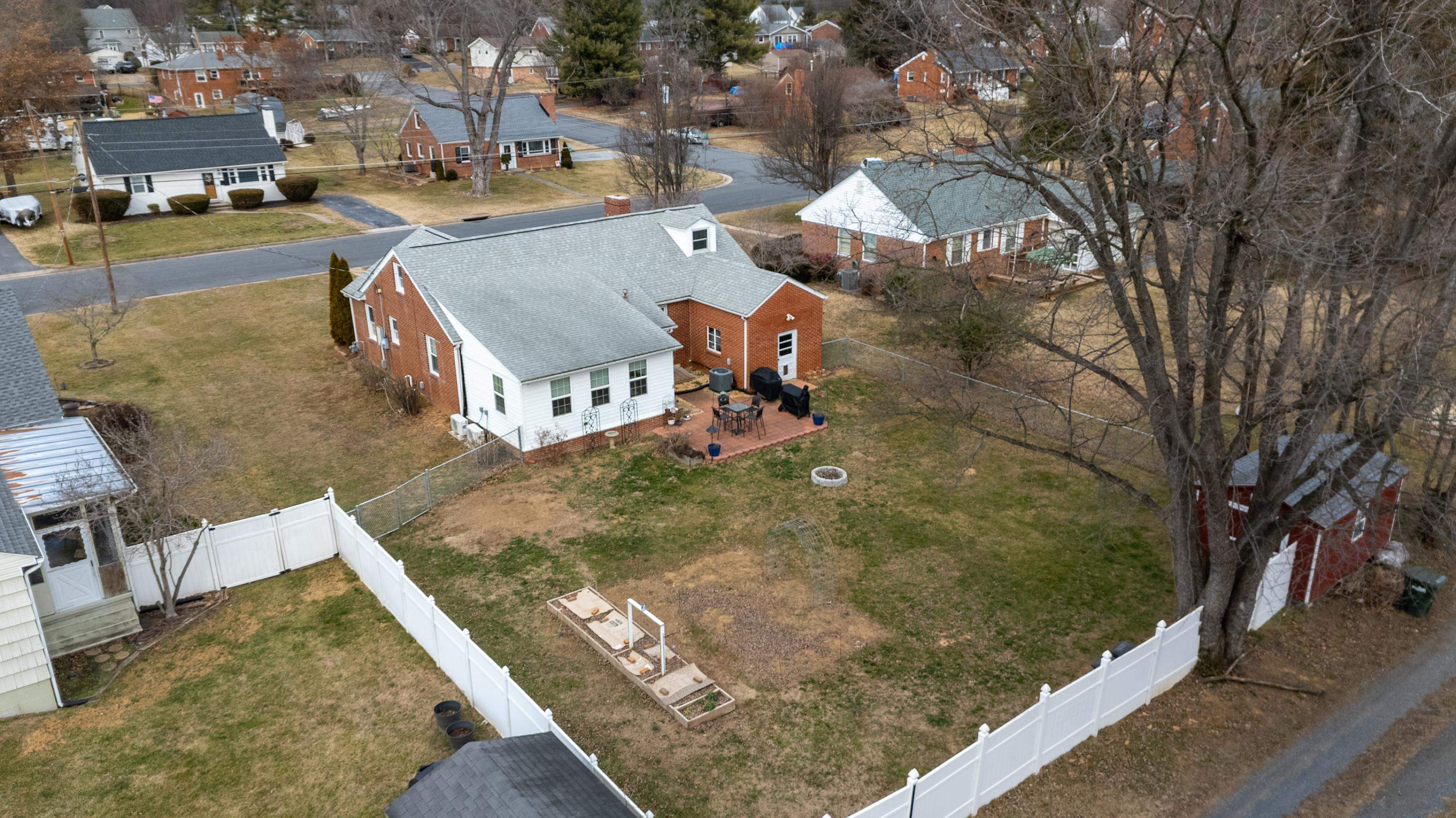 212 Alphin Avenue Waynesboro, VA 22980 - Photo 60 of 63 an aerial view of a house with swimming pool
