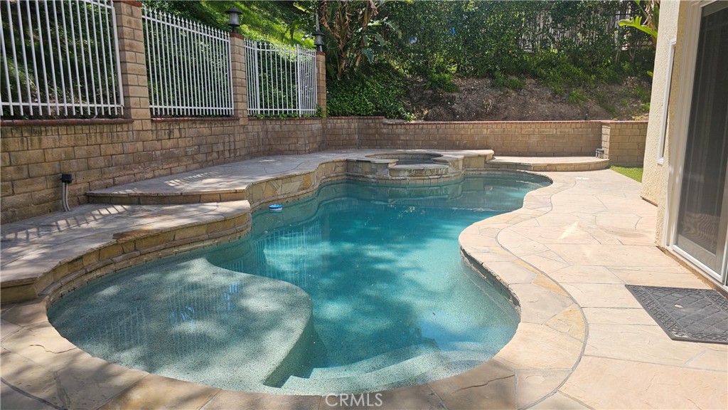 24722 Bracken Lane Stevenson Ranch, CA 91381 - Photo 34 of 36 a view of a swimming pool