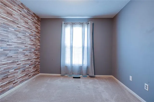 $315,000 | 123 South Darrowby Drive, Raymore, MO 64083