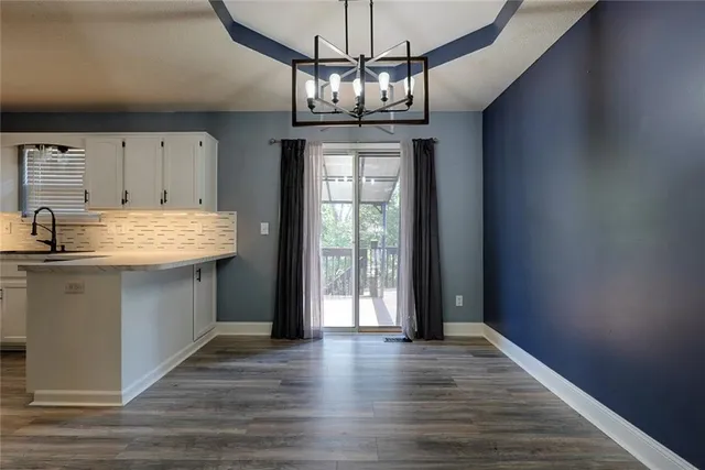 $315,000 | 123 South Darrowby Drive, Raymore, MO 64083