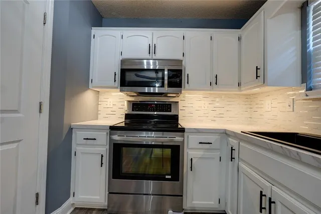 $315,000 | 123 South Darrowby Drive, Raymore, MO 64083