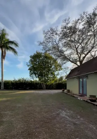 a view of outdoor space and yard