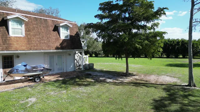 a backyard of a house with entertaining space