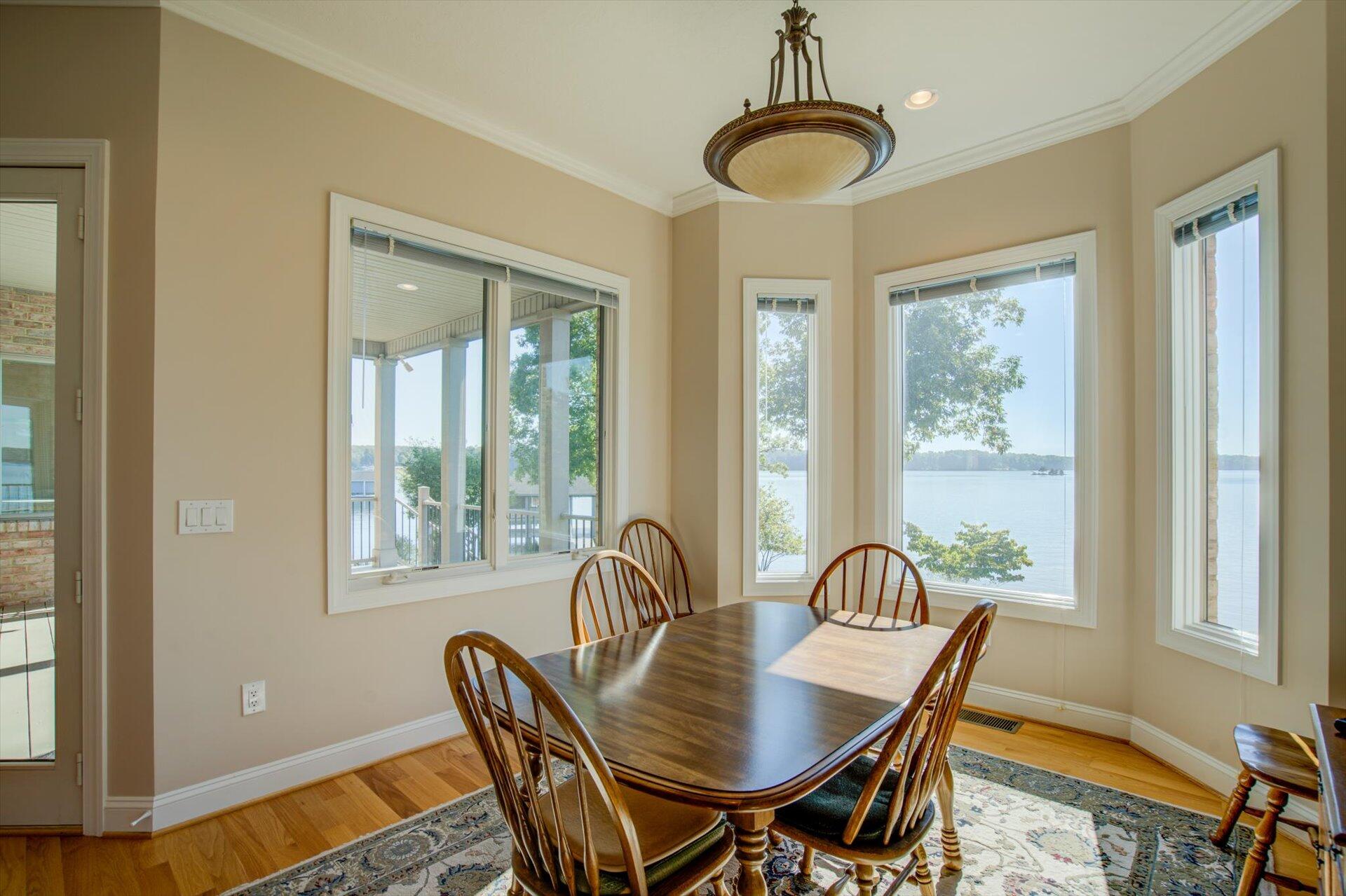 249 Pine Bay Drive Union Hall, VA 24176 - Photo 18 of 62 a view of a dining room with furniture window and outside view