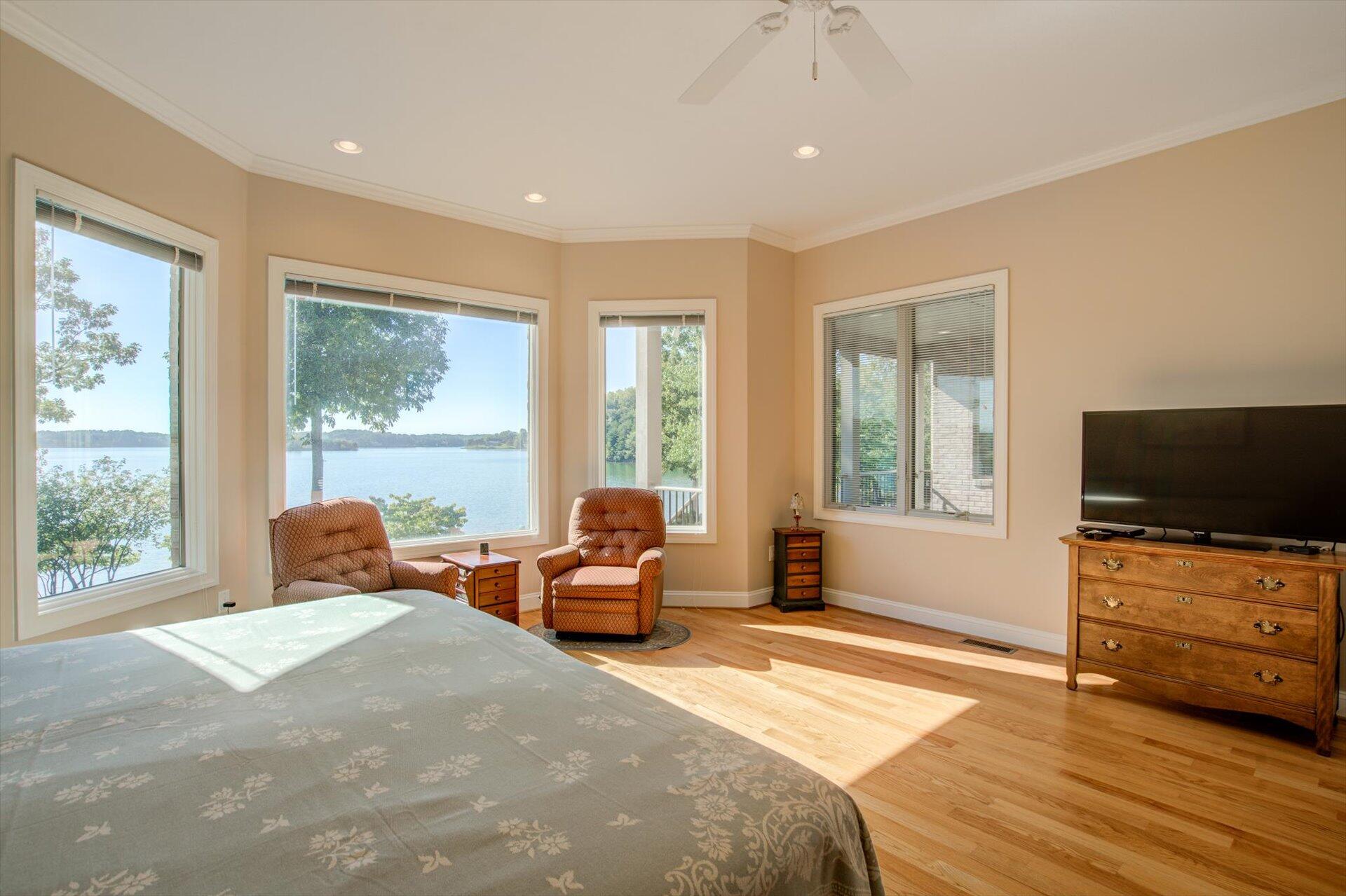 249 Pine Bay Drive Union Hall, VA 24176 - Photo 26 of 62 a bedroom with furniture and flat screen tv