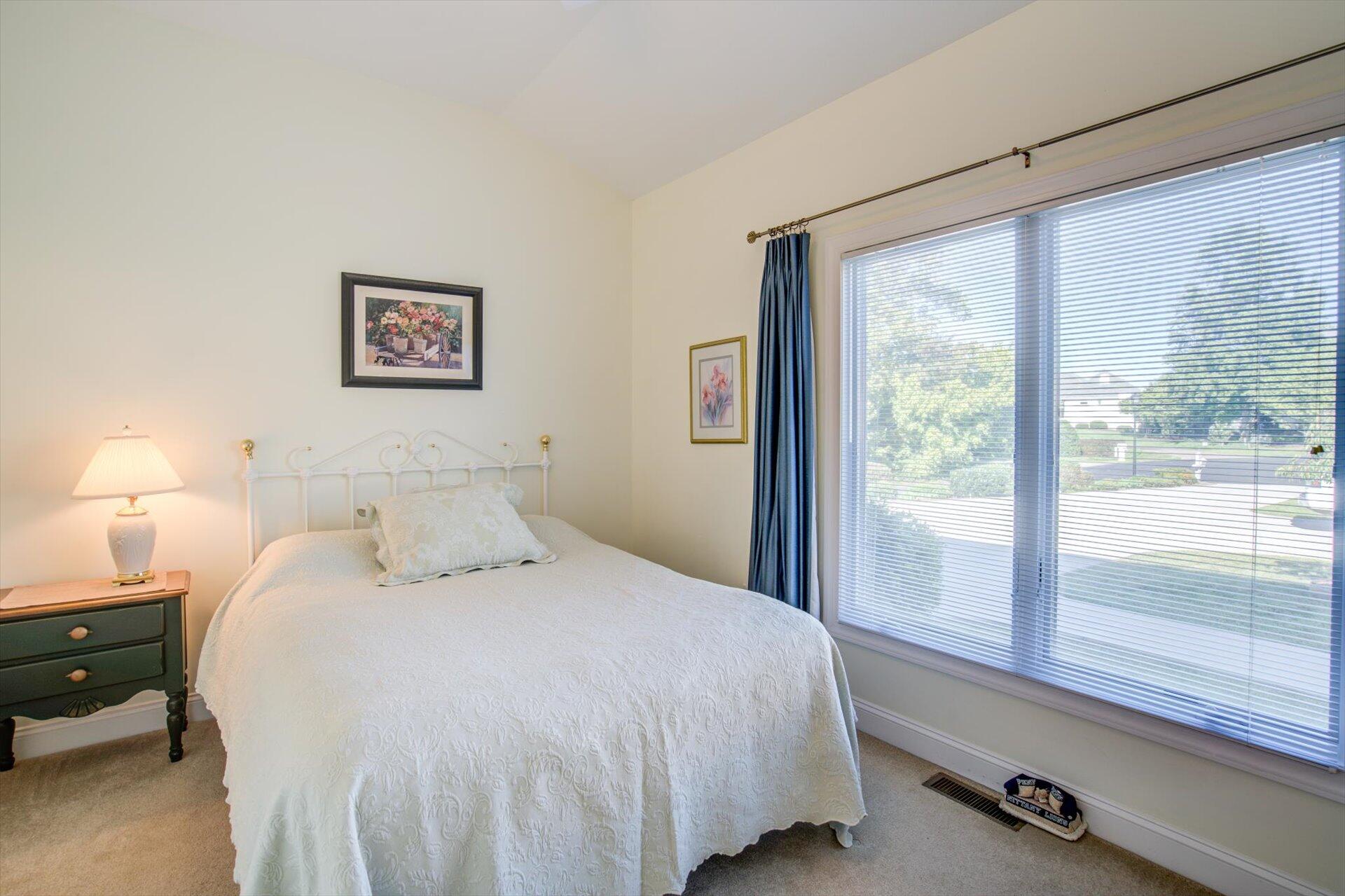 249 Pine Bay Drive Union Hall, VA 24176 - Photo 31 of 62 a bedroom with a bed and a large window