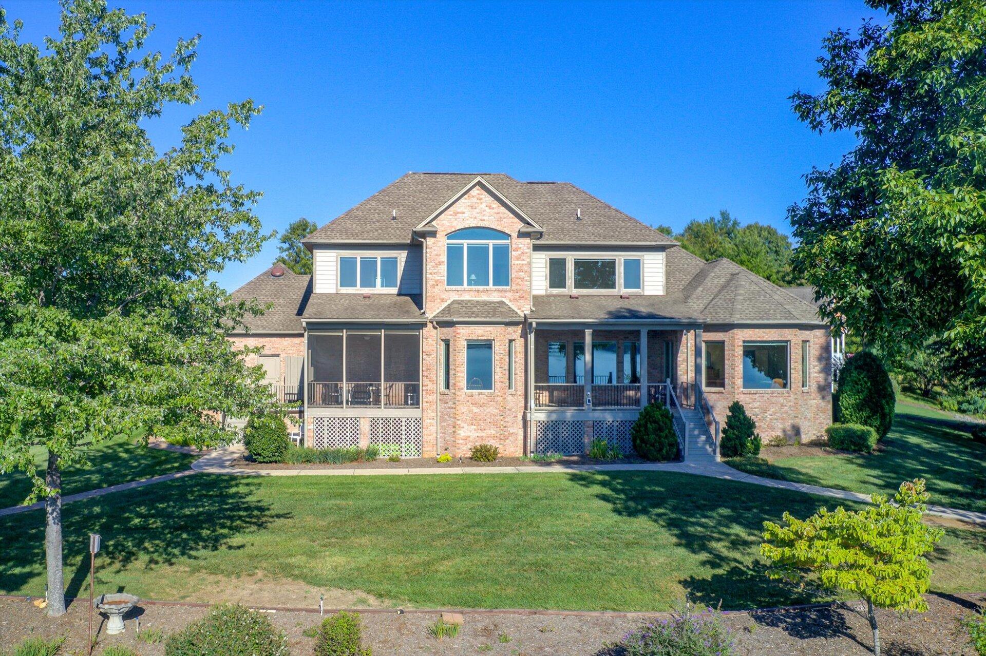 249 Pine Bay Drive Union Hall, VA 24176 - Photo 5 of 62 a front view of a house with a yard