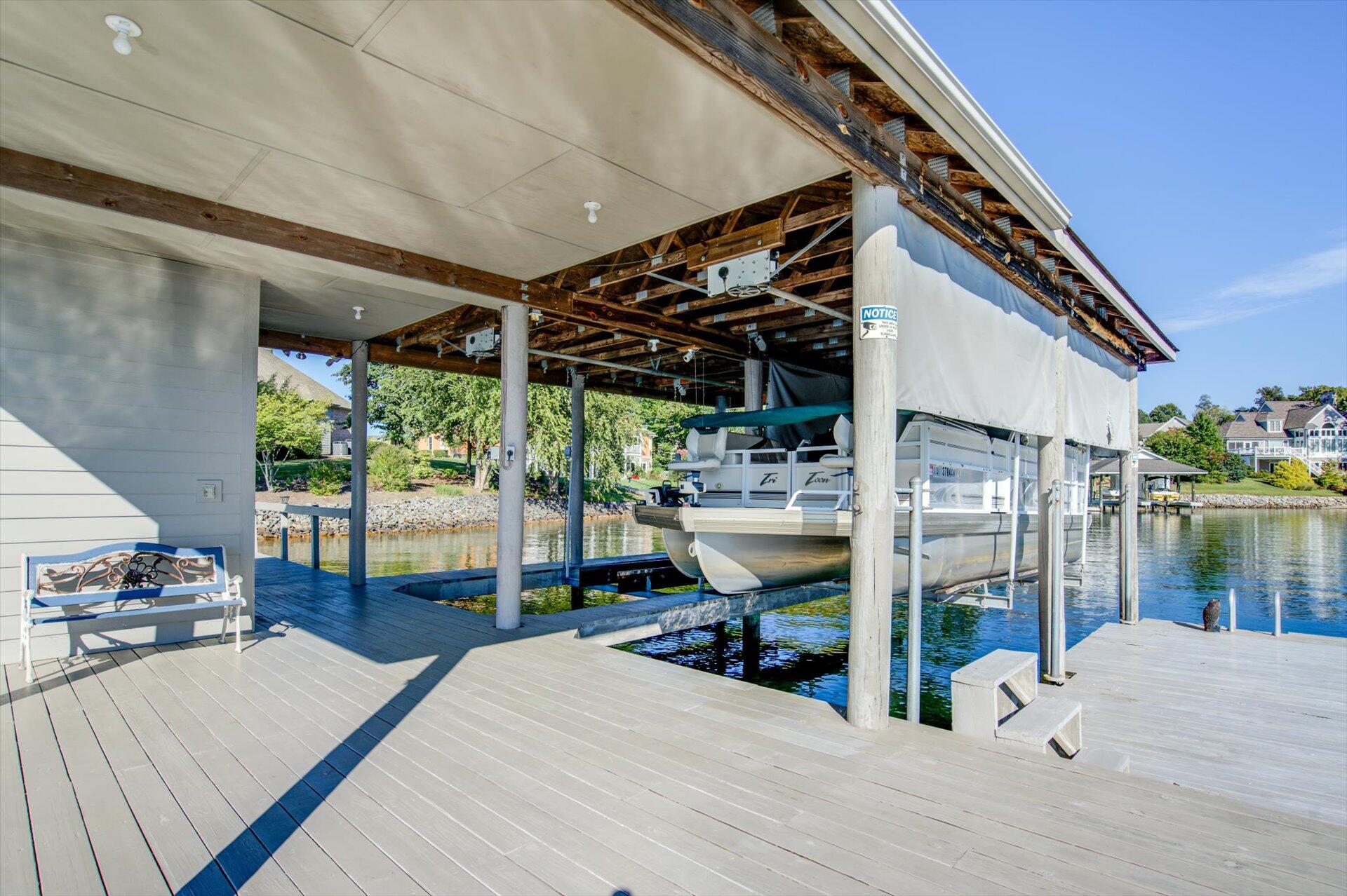 249 Pine Bay Drive Union Hall, VA 24176 - Photo 52 of 62 a bedroom with furniture and large windows