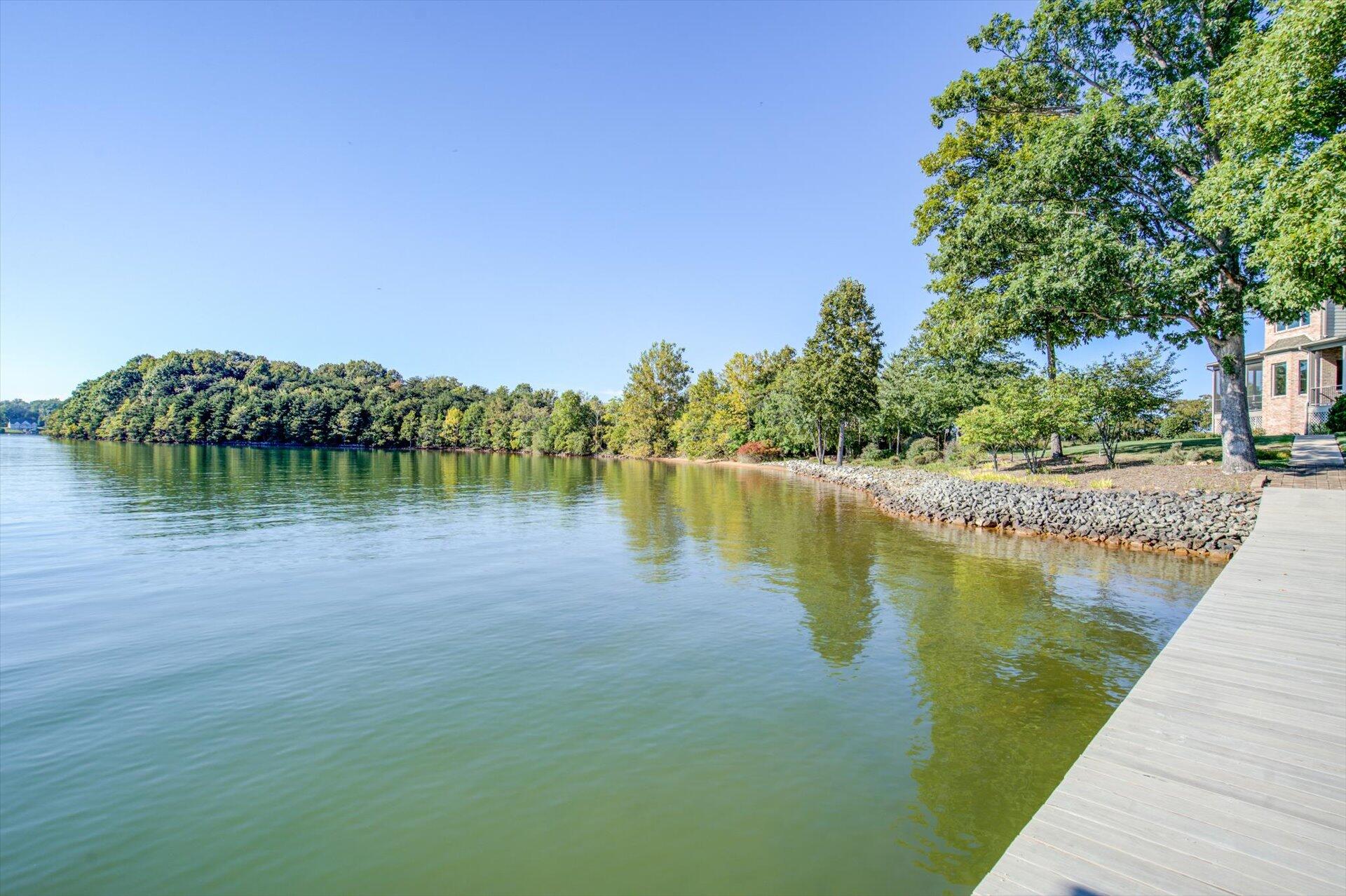 249 Pine Bay Drive Union Hall, VA 24176 - Photo 54 of 62 a view of a lake with a yard