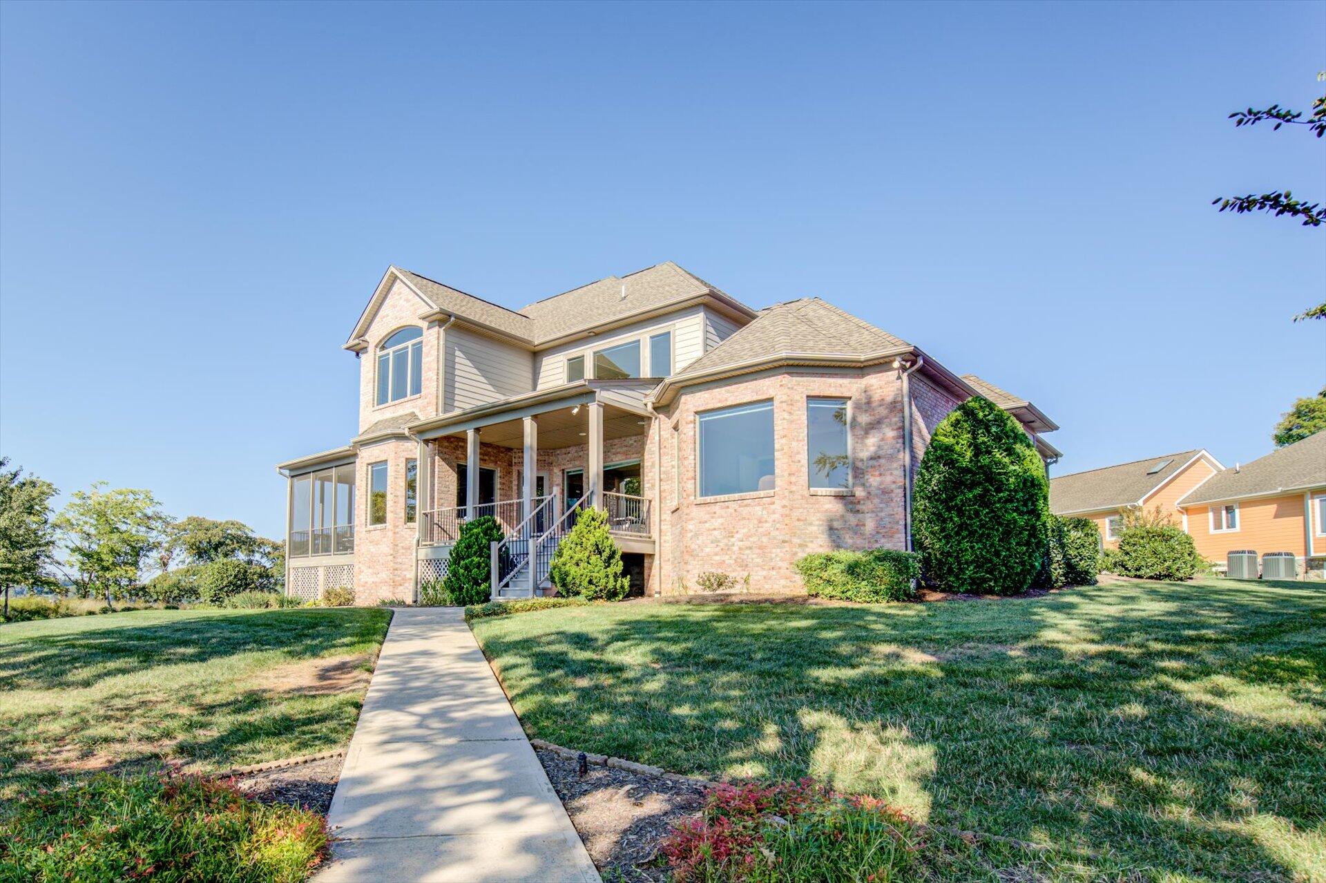 249 Pine Bay Drive Union Hall, VA 24176 - Photo 7 of 62 a front view of a house with a yard