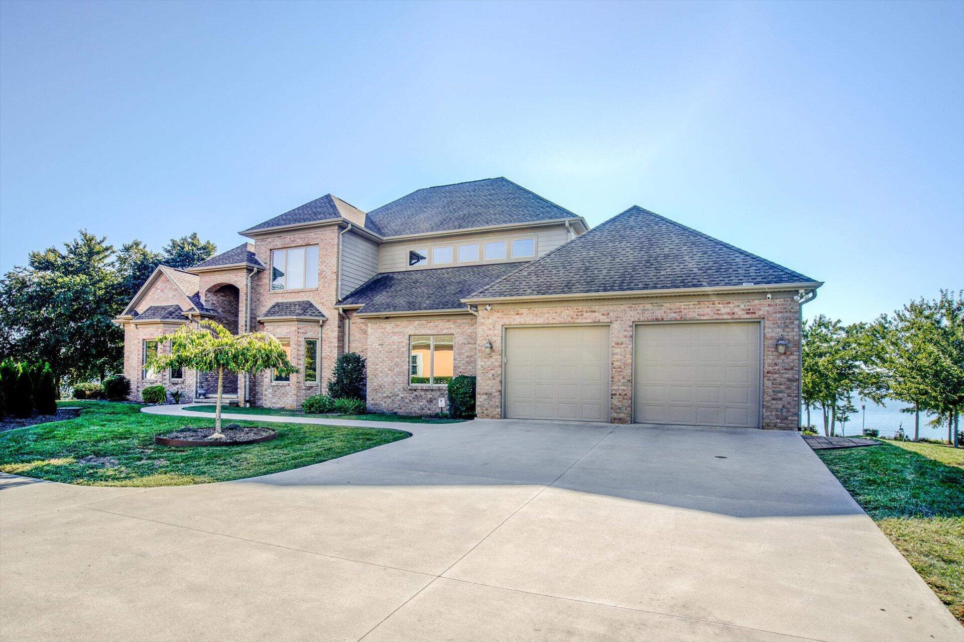 249 Pine Bay Drive Union Hall, VA 24176 - Photo 9 of 62 a front view of house with yard and green space