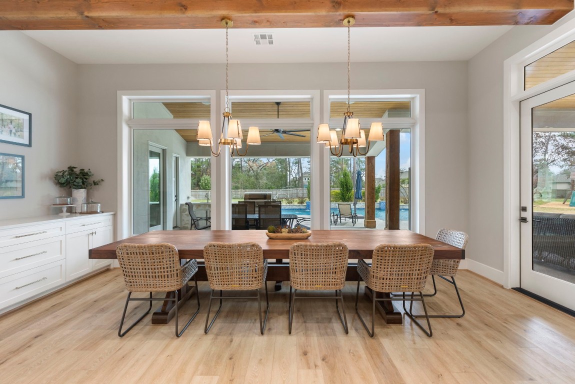 27318 Blue Cedar Lane Spring, TX 77386 - Photo 14 of 45 Dining room overlooks the patio and pool.