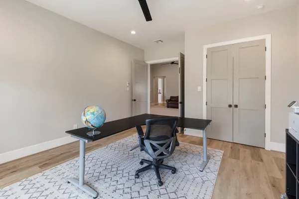 a room with stairs and furniture