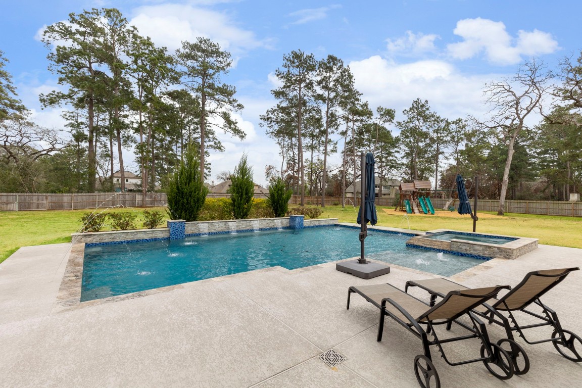 27318 Blue Cedar Lane Spring, TX 77386 - Photo 34 of 45 View of resort-style pool and spa from patio.