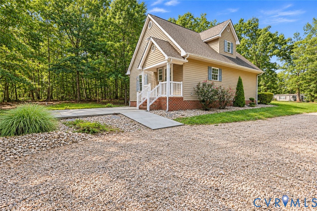 1626 Oak Ridge Road Appomattox, VA 24522 - Photo 7 of 30 Siding exterior with brick foundation and a gravel
