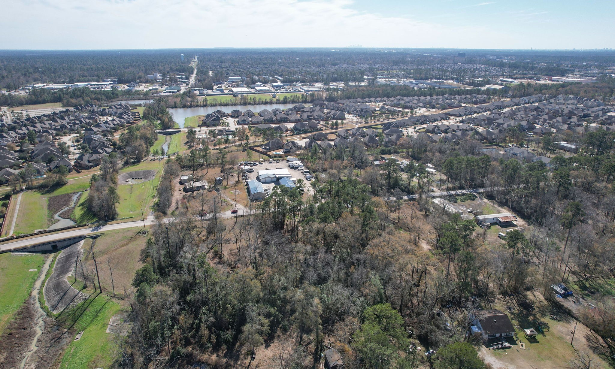 22475-22463 Adams Street Porter, TX 77365 - Photo 14 of 18 an aerial view of multiple house