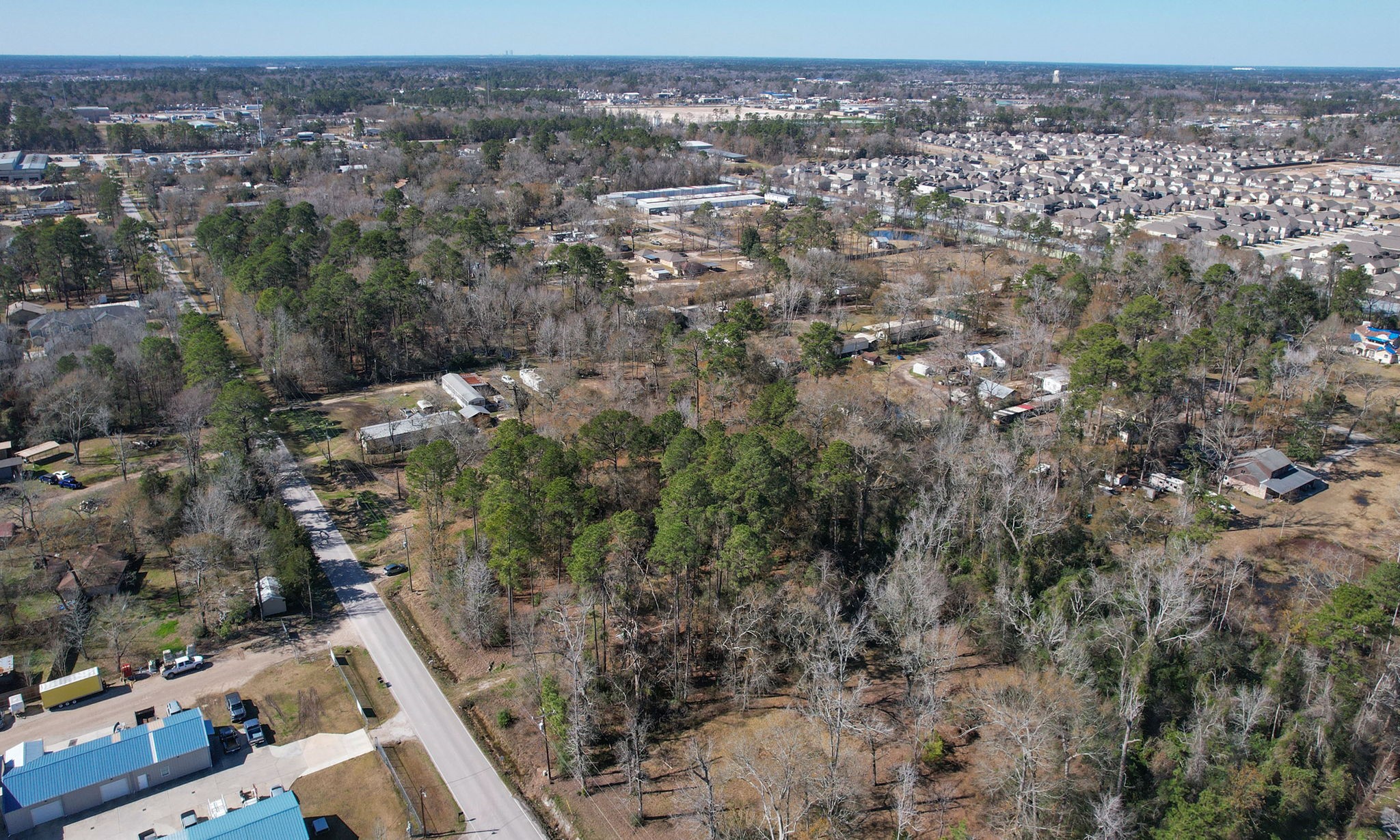 22475-22463 Adams Street Porter, TX 77365 - Photo 15 of 18 an aerial view of multiple house