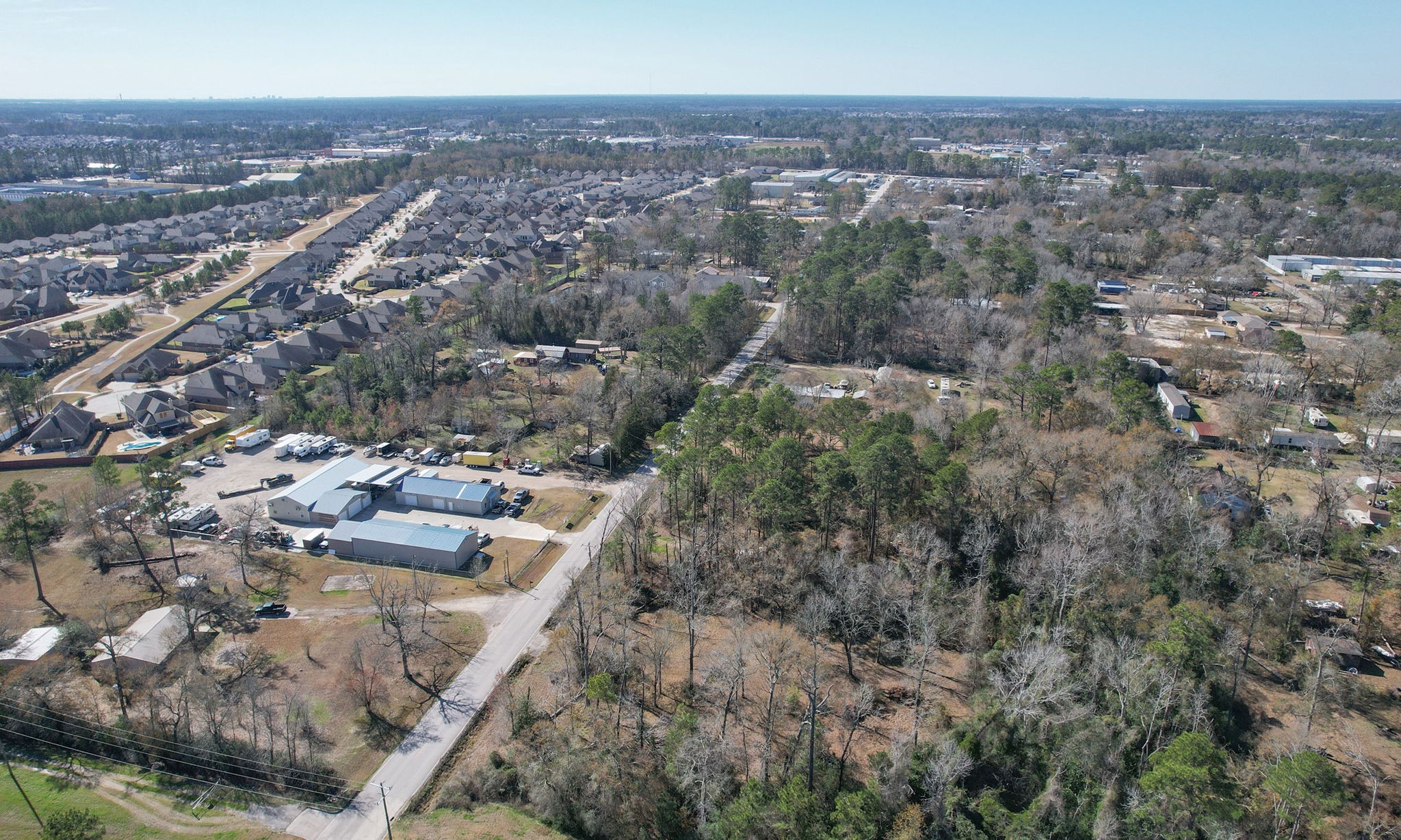 22475-22463 Adams Street Porter, TX 77365 - Photo 4 of 18 an aerial view of multiple house