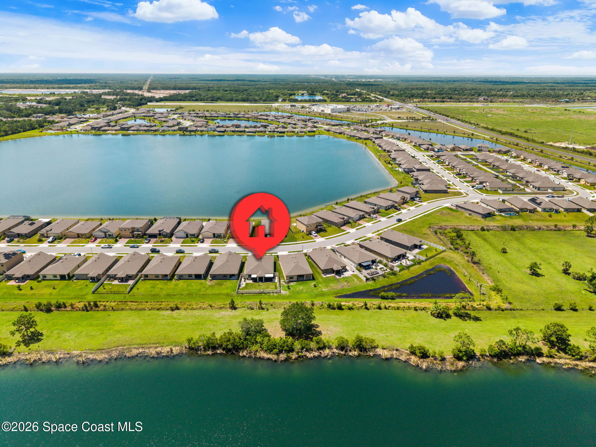 2043 Farmhouse Road Southeast Palm Bay, FL 32909 - Photo 29 of 36 Drone View w Pin