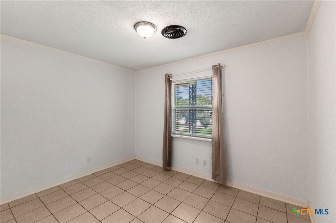 103 Cheaney Spur Killeen, TX 76543 - Photo 16 of 21 a view of an empty room and window