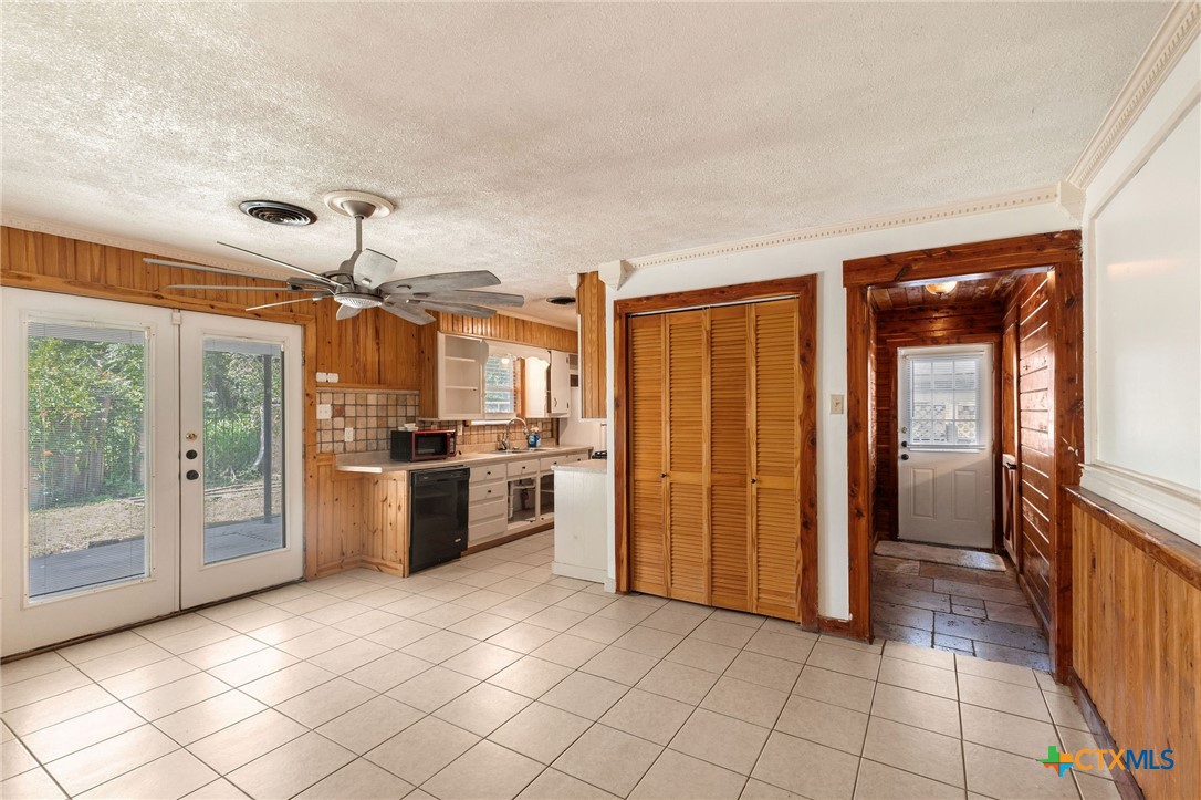 103 Cheaney Spur Killeen, TX 76543 - Photo 7 of 21 a view of a kitchen with a sink and a refrigerator