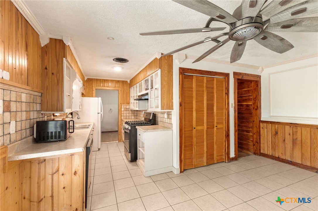 103 Cheaney Spur Killeen, TX 76543 - Photo 8 of 21 a view of a kitchen with furniture and a window