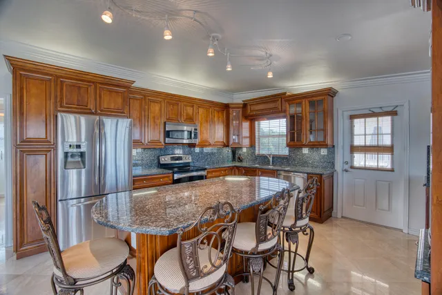 a view of a bathroom from a corridor
