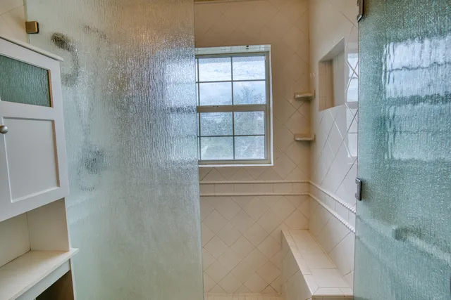 a view of empty room with windows