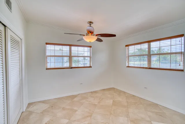 a bathroom with a shower sink and mirror