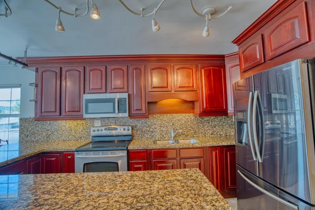 a view of a patio with swimming pool