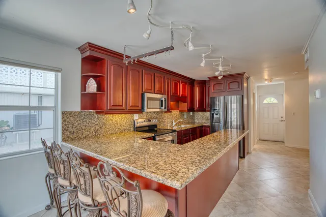 a view of a house with a patio