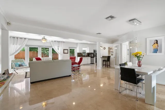 a living room with furniture and a table