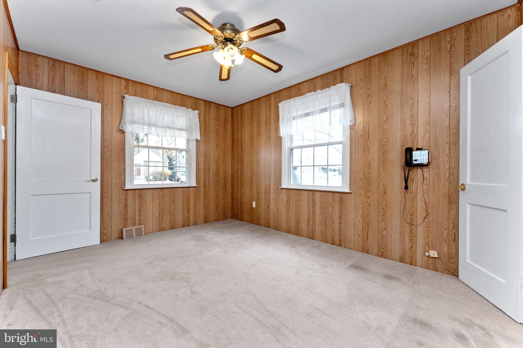 411 Buse Street Ridley Park, PA 19078 - Photo 16 of 30 an empty room with windows and closet