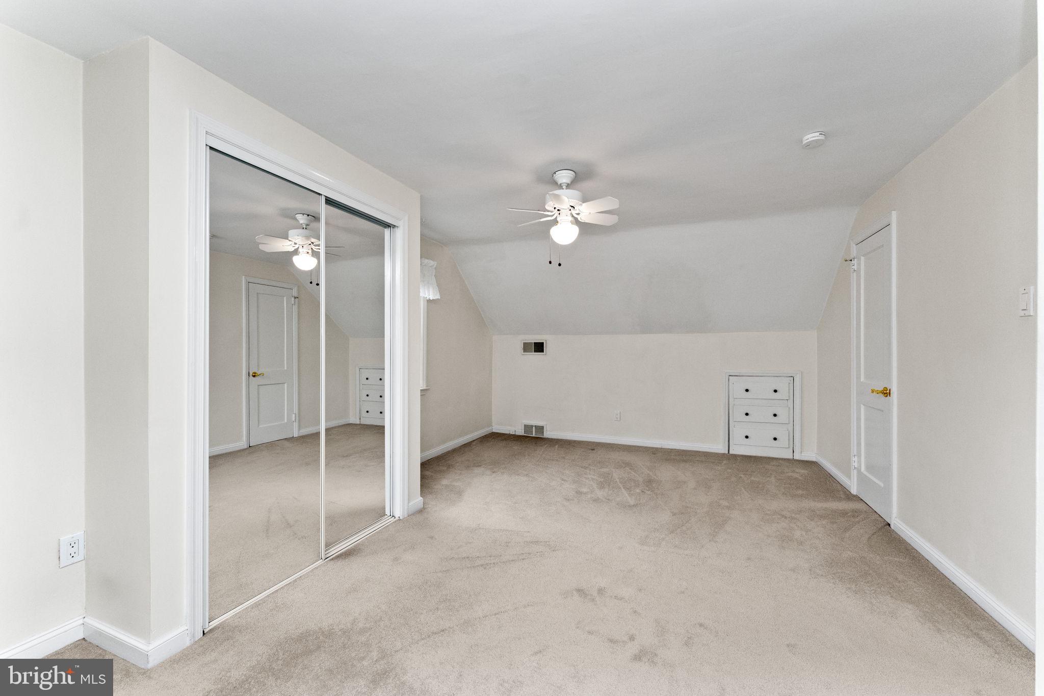 411 Buse Street Ridley Park, PA 19078 - Photo 19 of 30 an empty room with chandelier fan