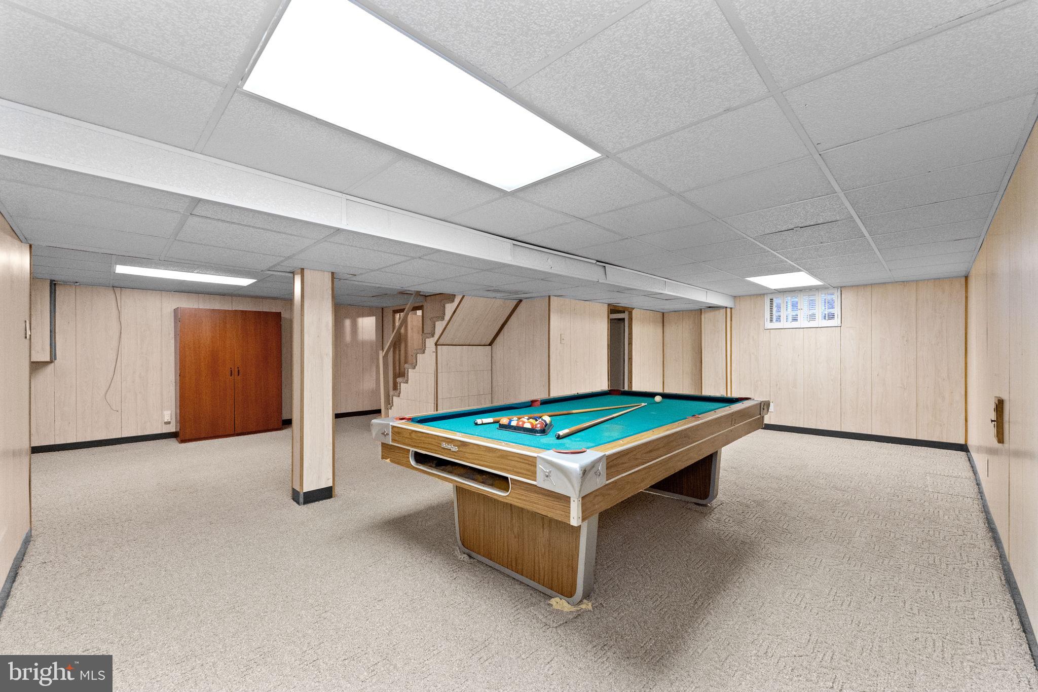 411 Buse Street Ridley Park, PA 19078 - Photo 24 of 30 a room with pool table and windows