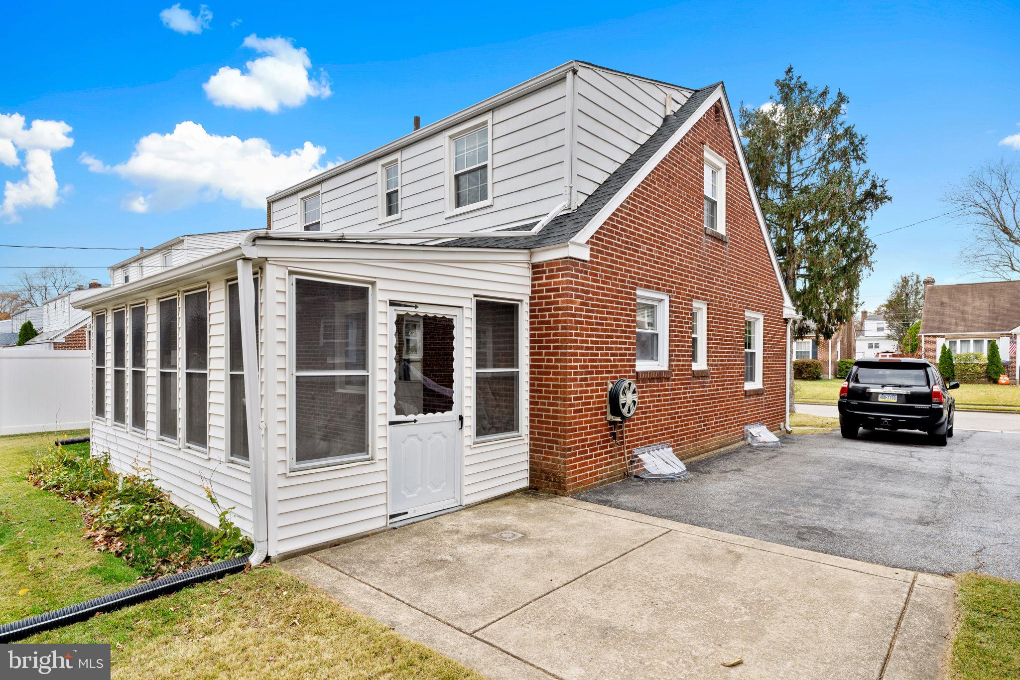411 Buse Street Ridley Park, PA 19078 - Photo 29 of 30 a view of a house with a yard
