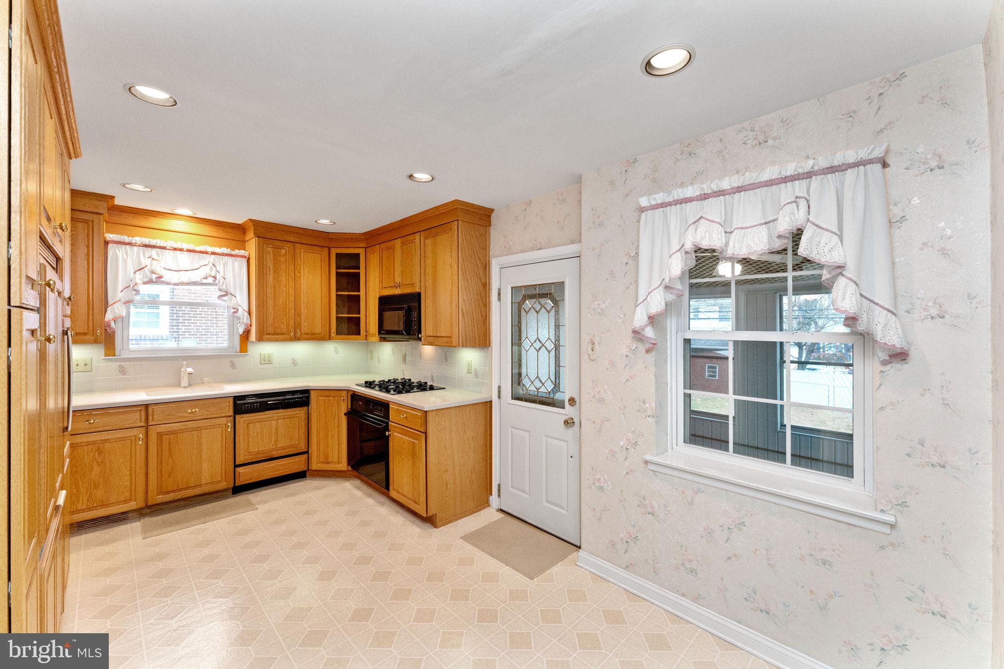 411 Buse Street Ridley Park, PA 19078 - Photo 10 of 30 a large kitchen with a large window