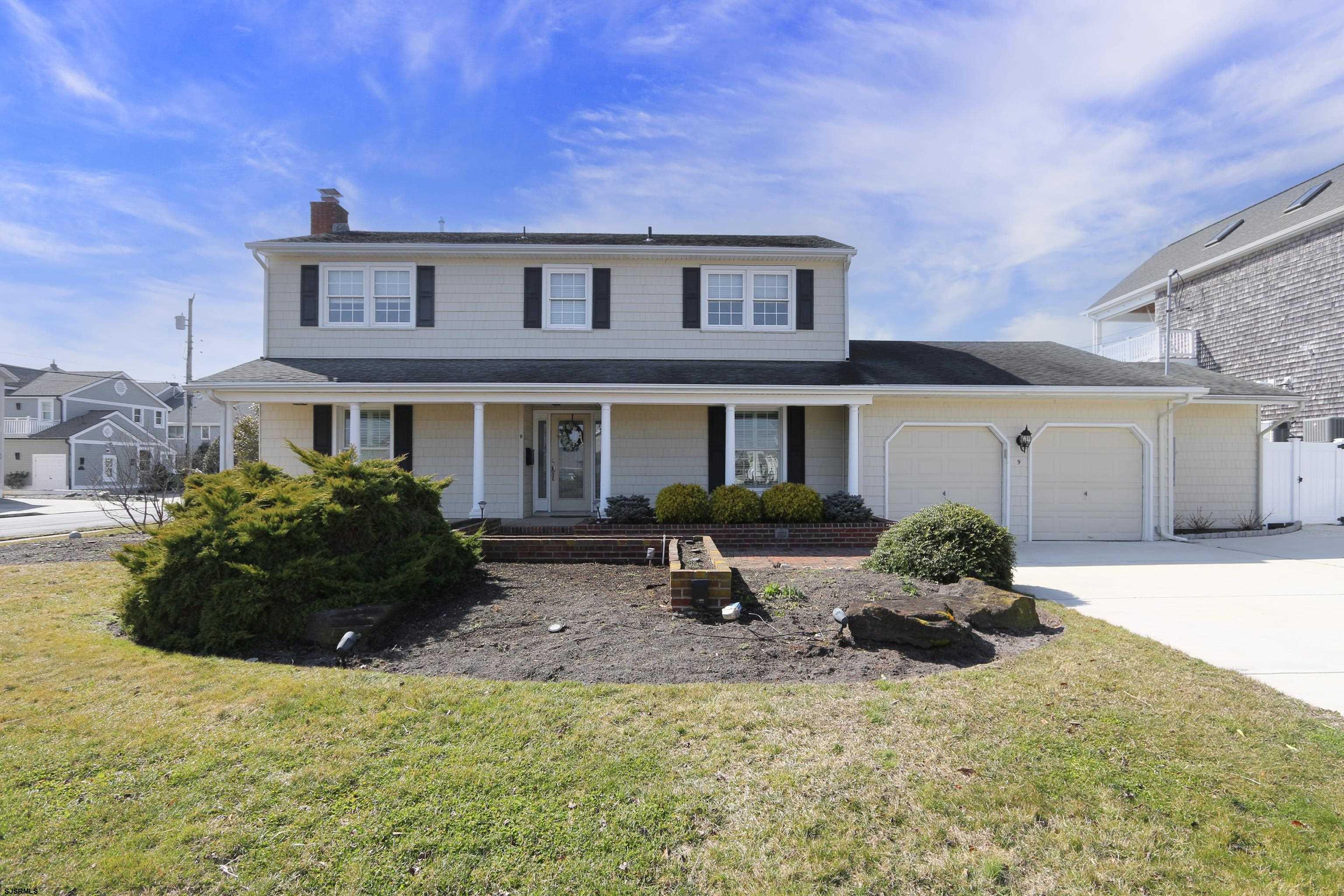 a house view with a garden space