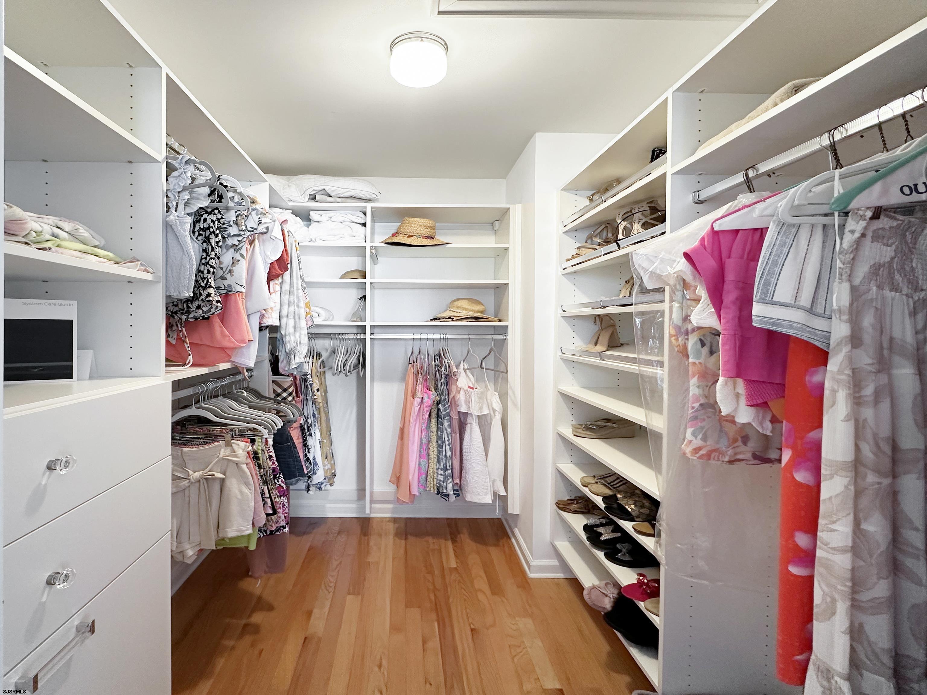 9 Sunset Boulevard Egg Harbor Township, NJ 08403 - Photo 17 of 60 a view of walk in closet with clothes and shoes