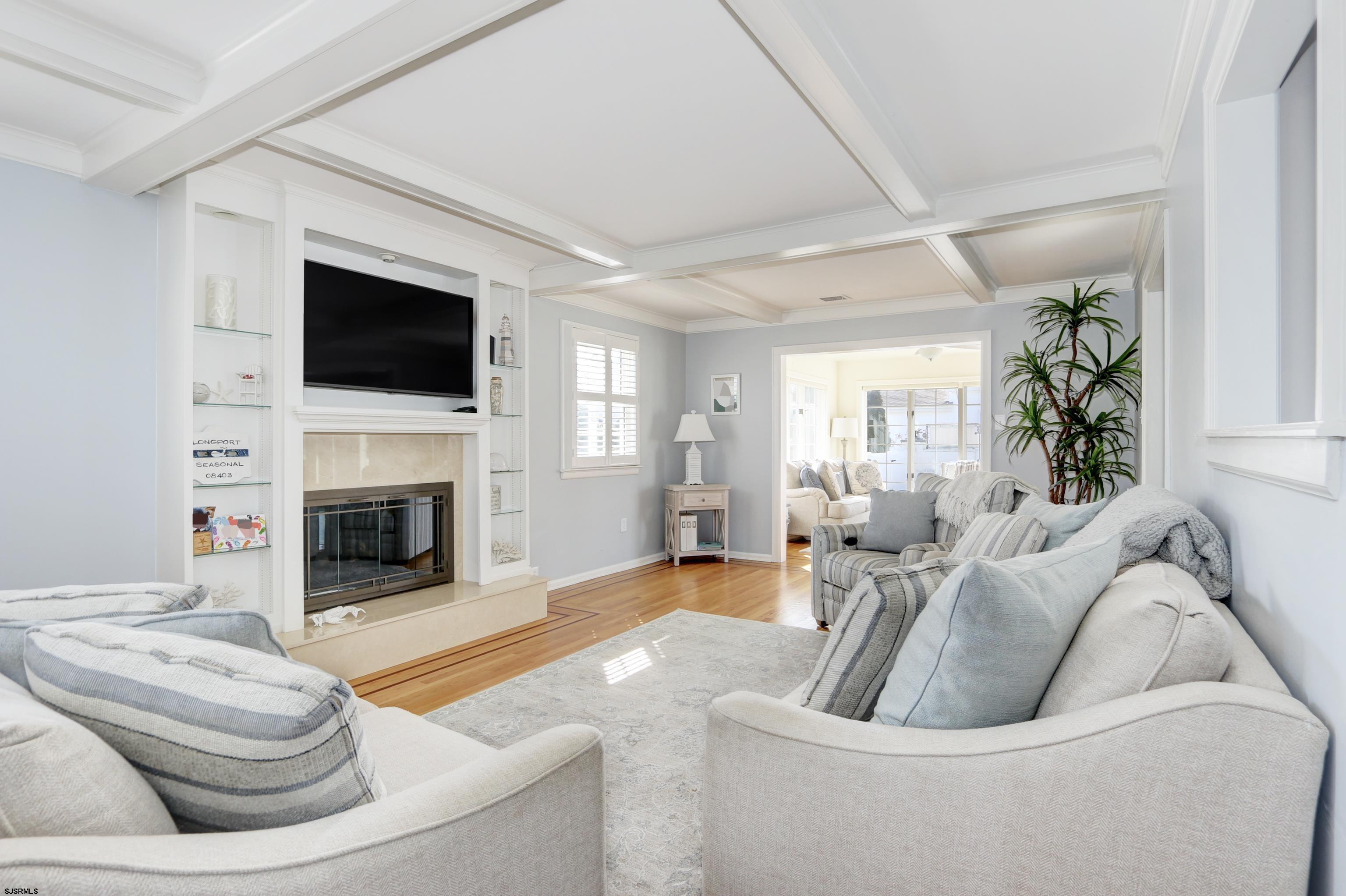 9 Sunset Boulevard Egg Harbor Township, NJ 08403 - Photo 2 of 60 a living room with furniture and a fireplace