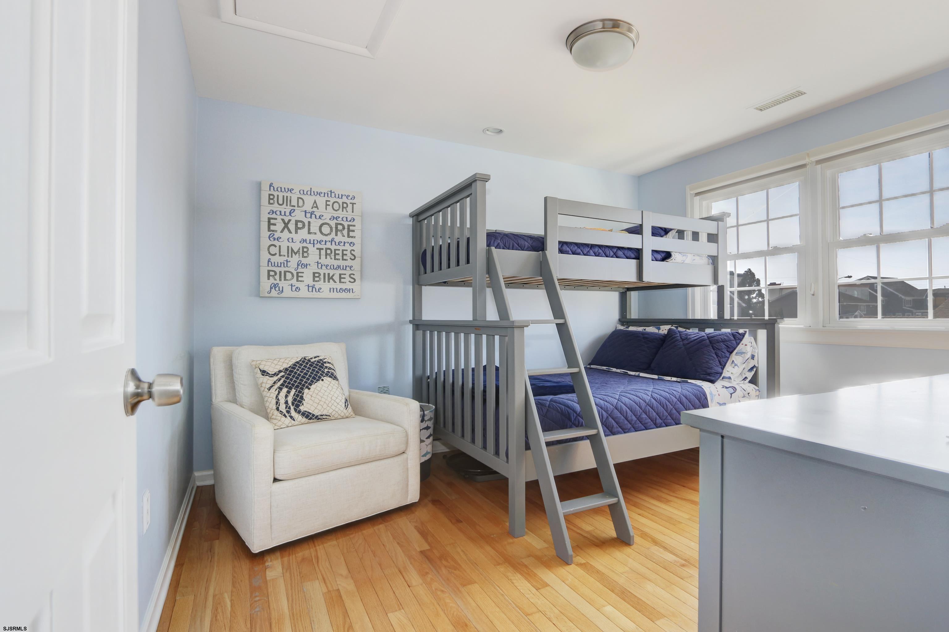 9 Sunset Boulevard Egg Harbor Township, NJ 08403 - Photo 23 of 60 a living room with furniture and a wooden floor
