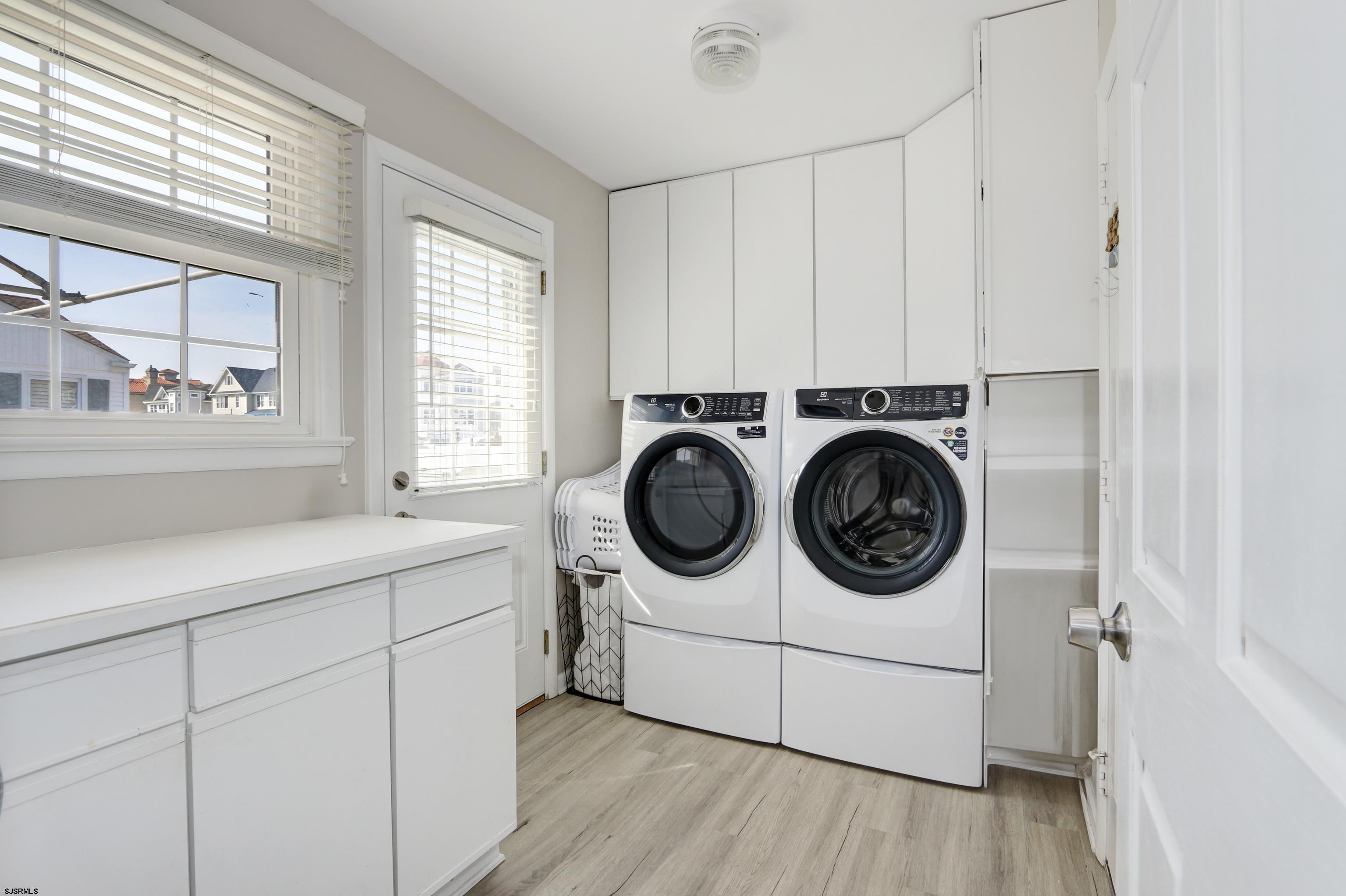 9 Sunset Boulevard Egg Harbor Township, NJ 08403 - Photo 26 of 60 a utility room with sink dryer and washer