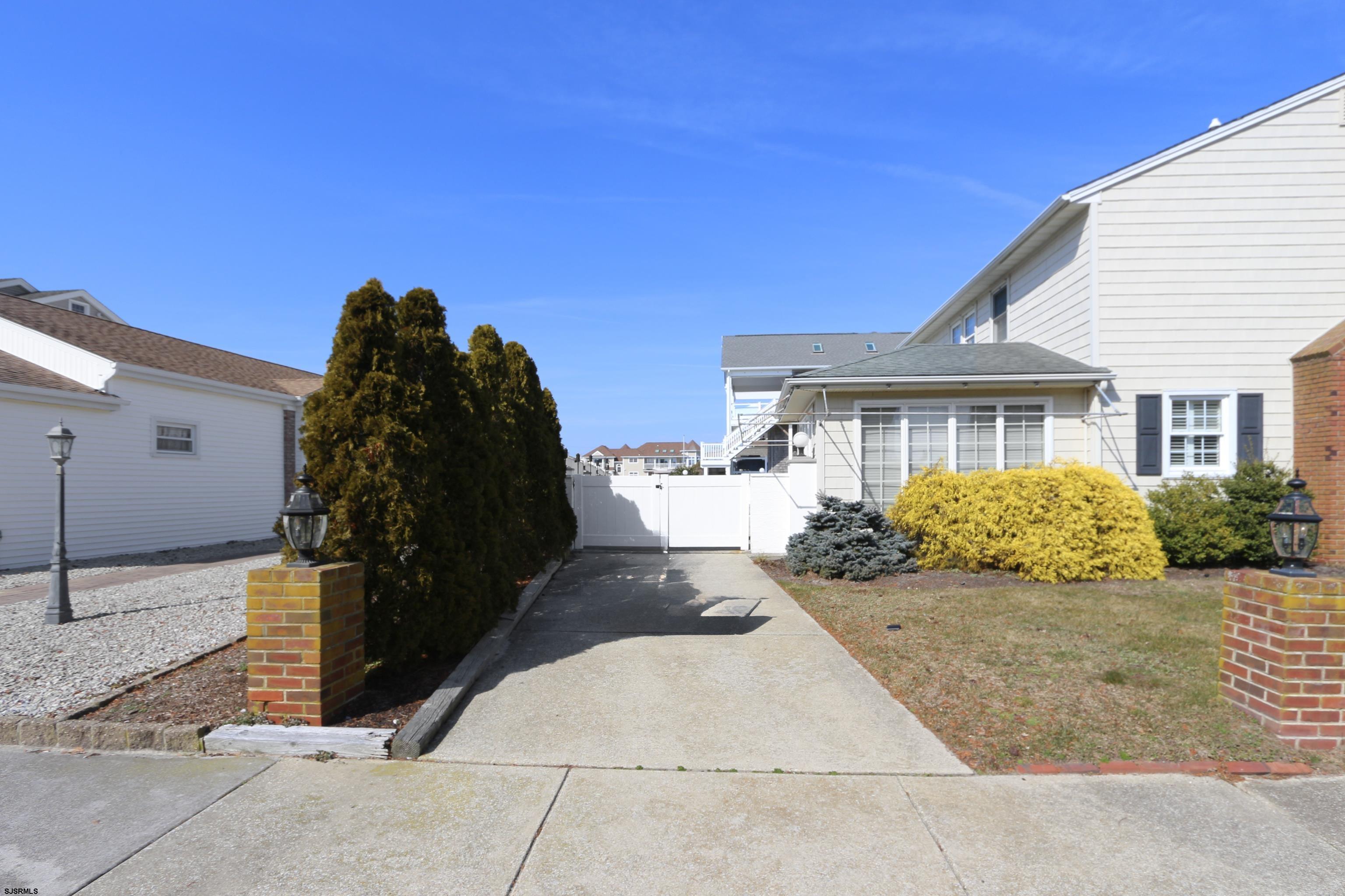 9 Sunset Boulevard Egg Harbor Township, NJ 08403 - Photo 35 of 60 a front view of a house with a garage