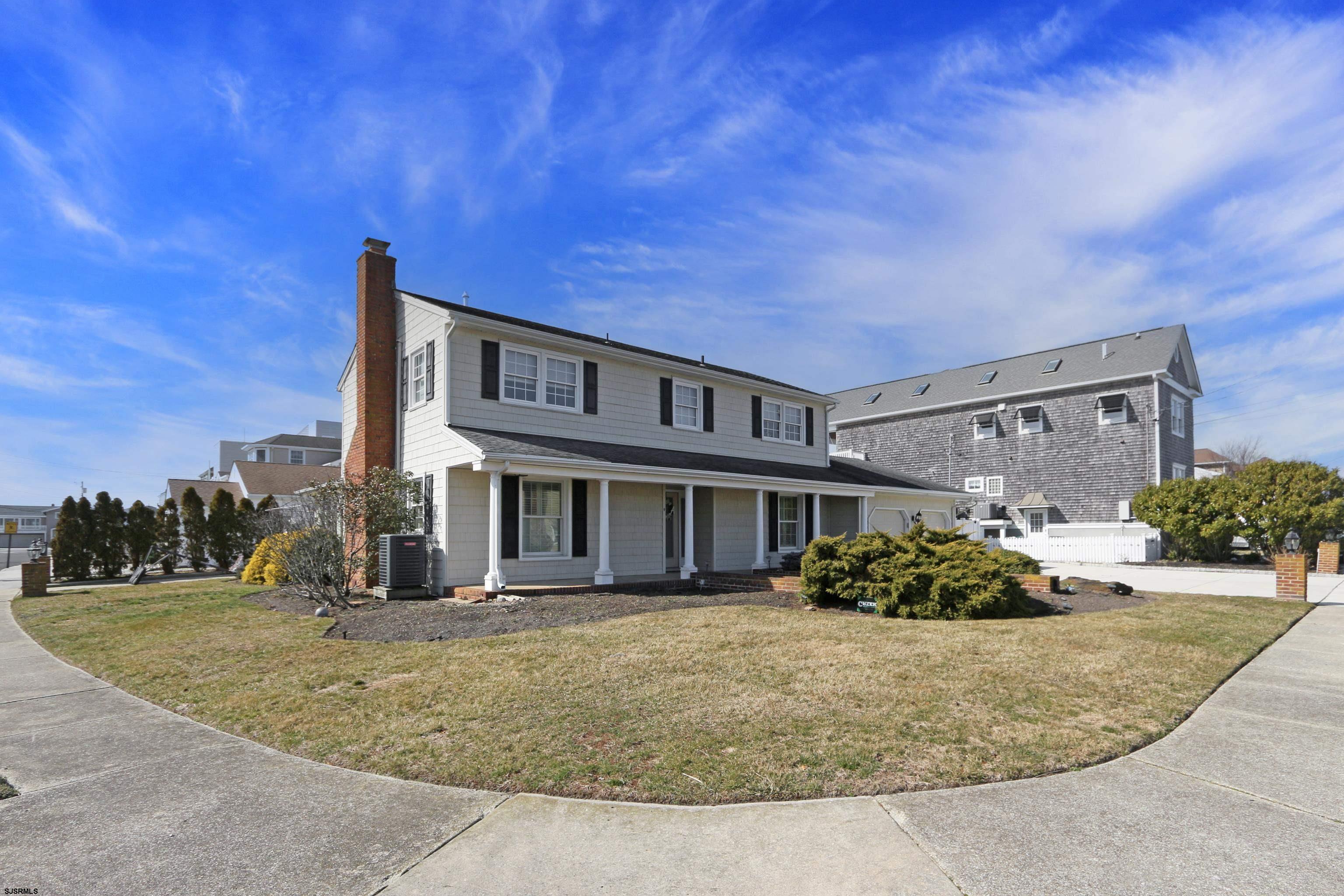 9 Sunset Boulevard Egg Harbor Township, NJ 08403 - Photo 37 of 60 front view of a house with a yard