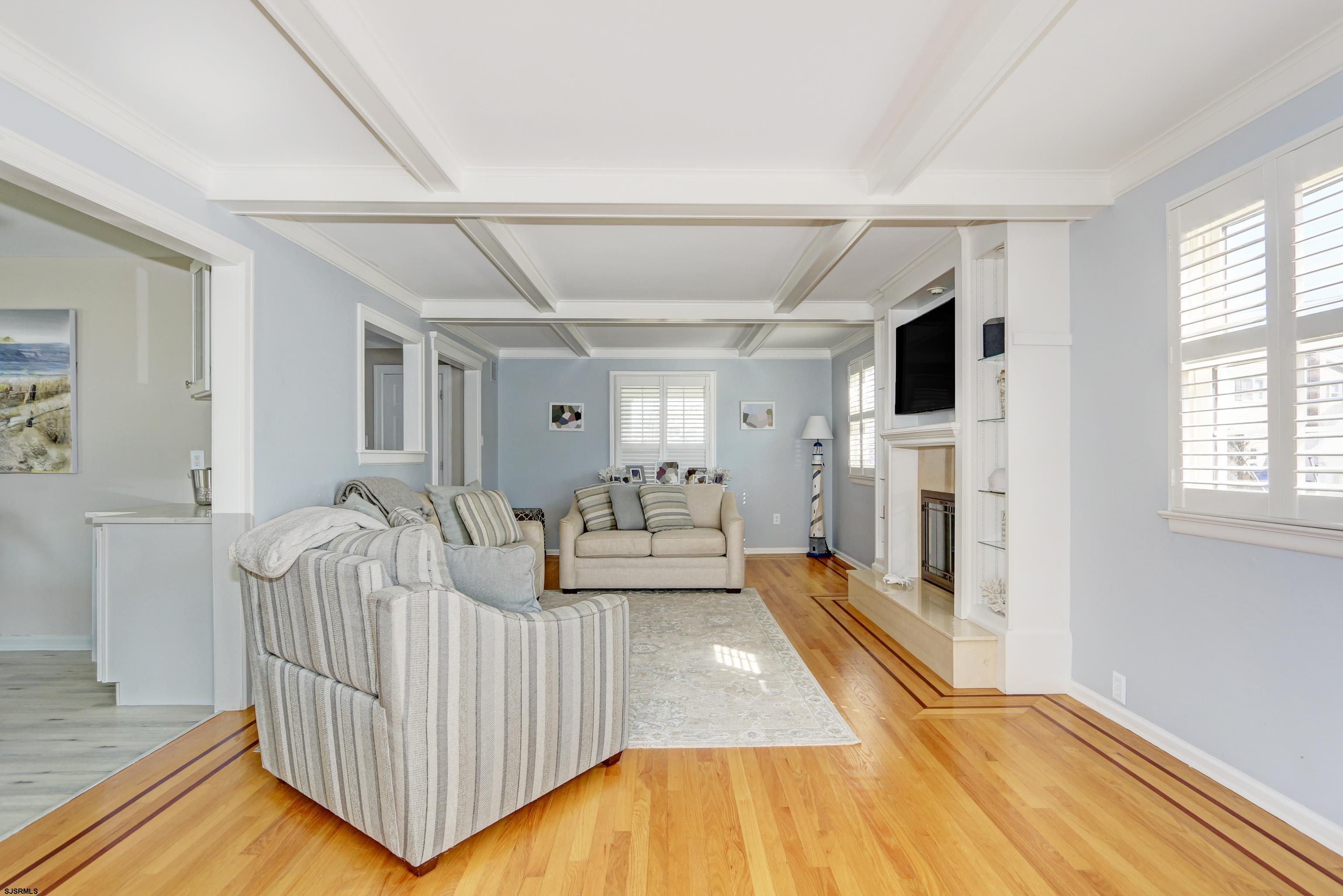 9 Sunset Boulevard Egg Harbor Township, NJ 08403 - Photo 4 of 60 a living room with furniture and a fireplace