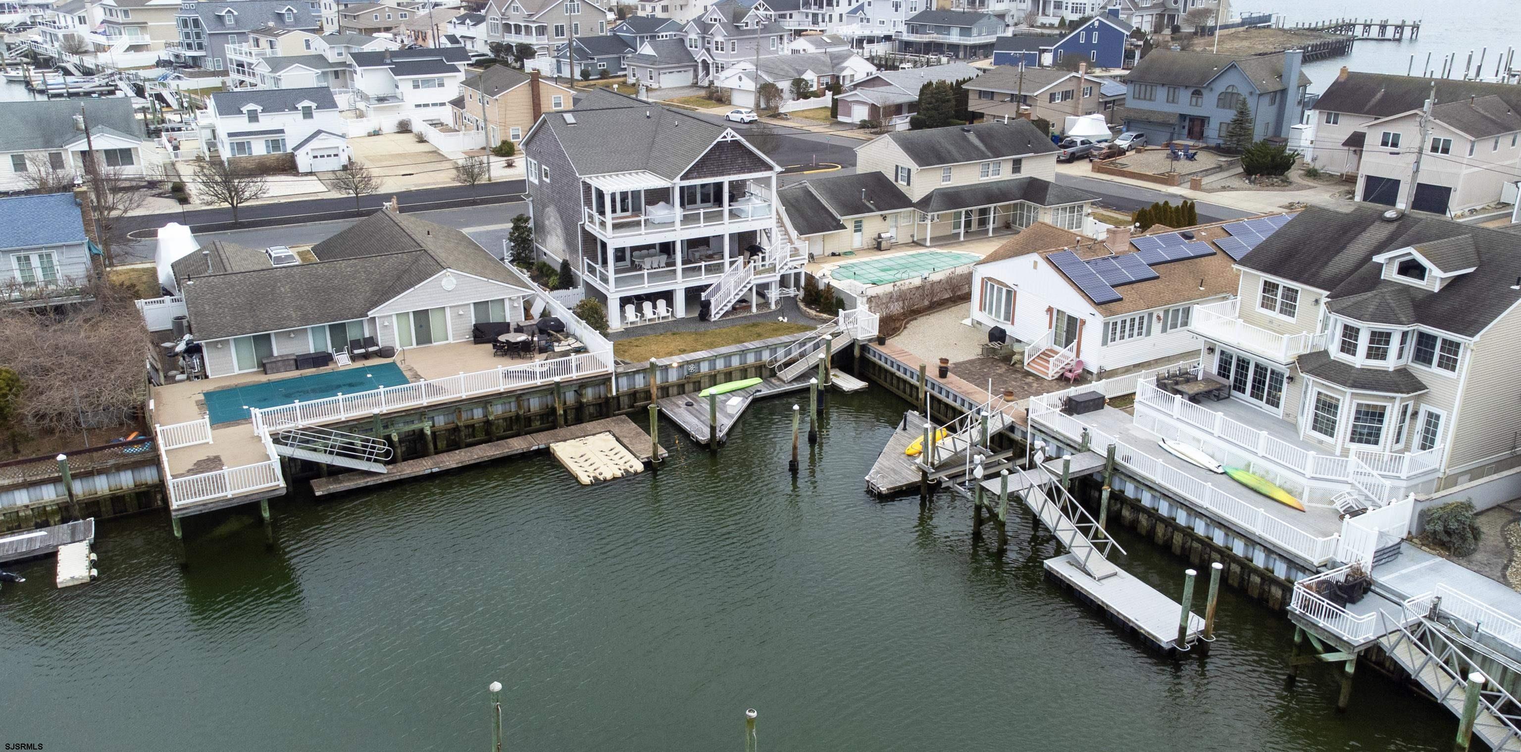 9 Sunset Boulevard Egg Harbor Township, NJ 08403 - Photo 44 of 60 an aerial view of residential houses with outdoor space and swimming pool