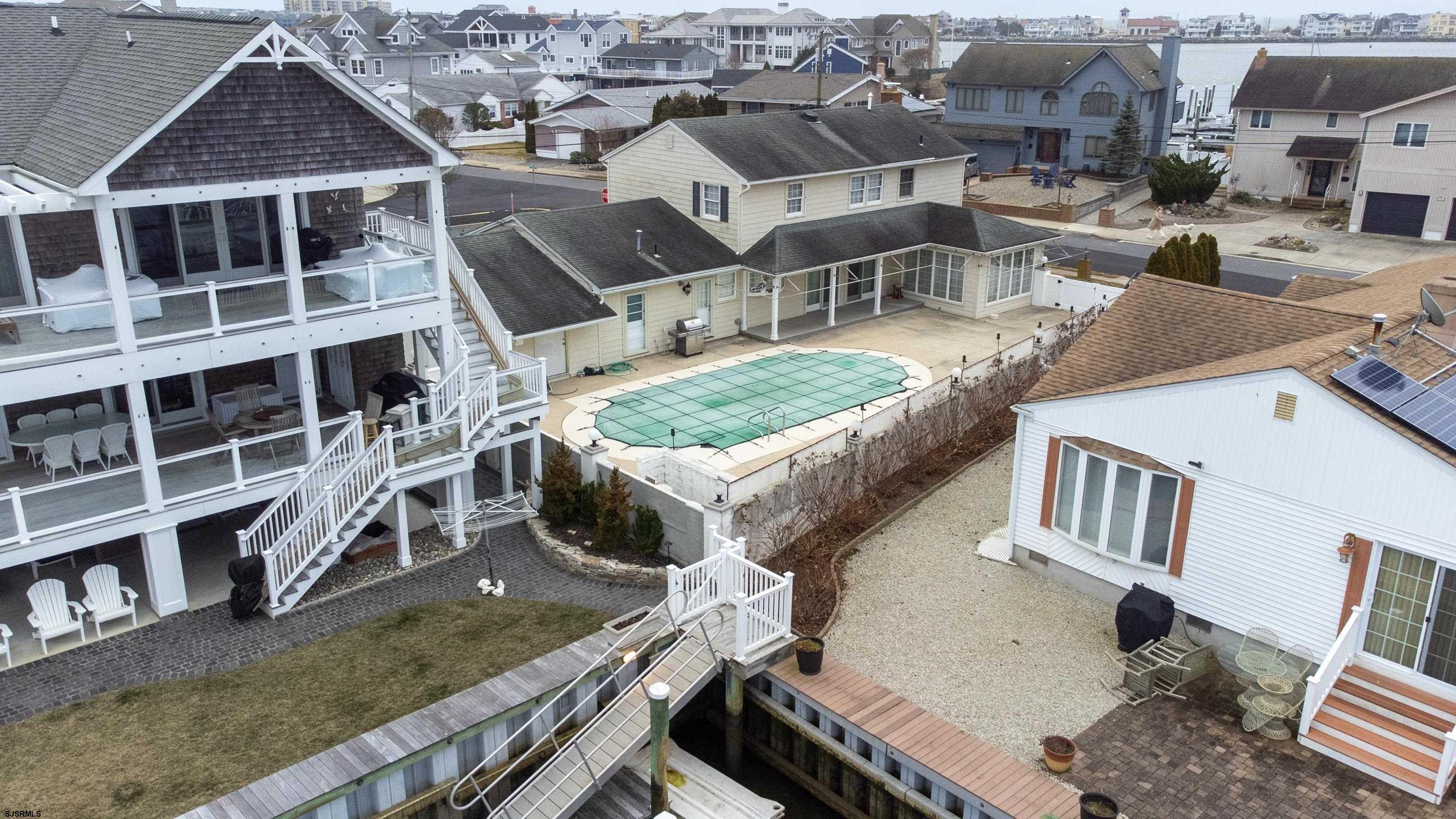 9 Sunset Boulevard Egg Harbor Township, NJ 08403 - Photo 46 of 60 an aerial view of a house with a yard