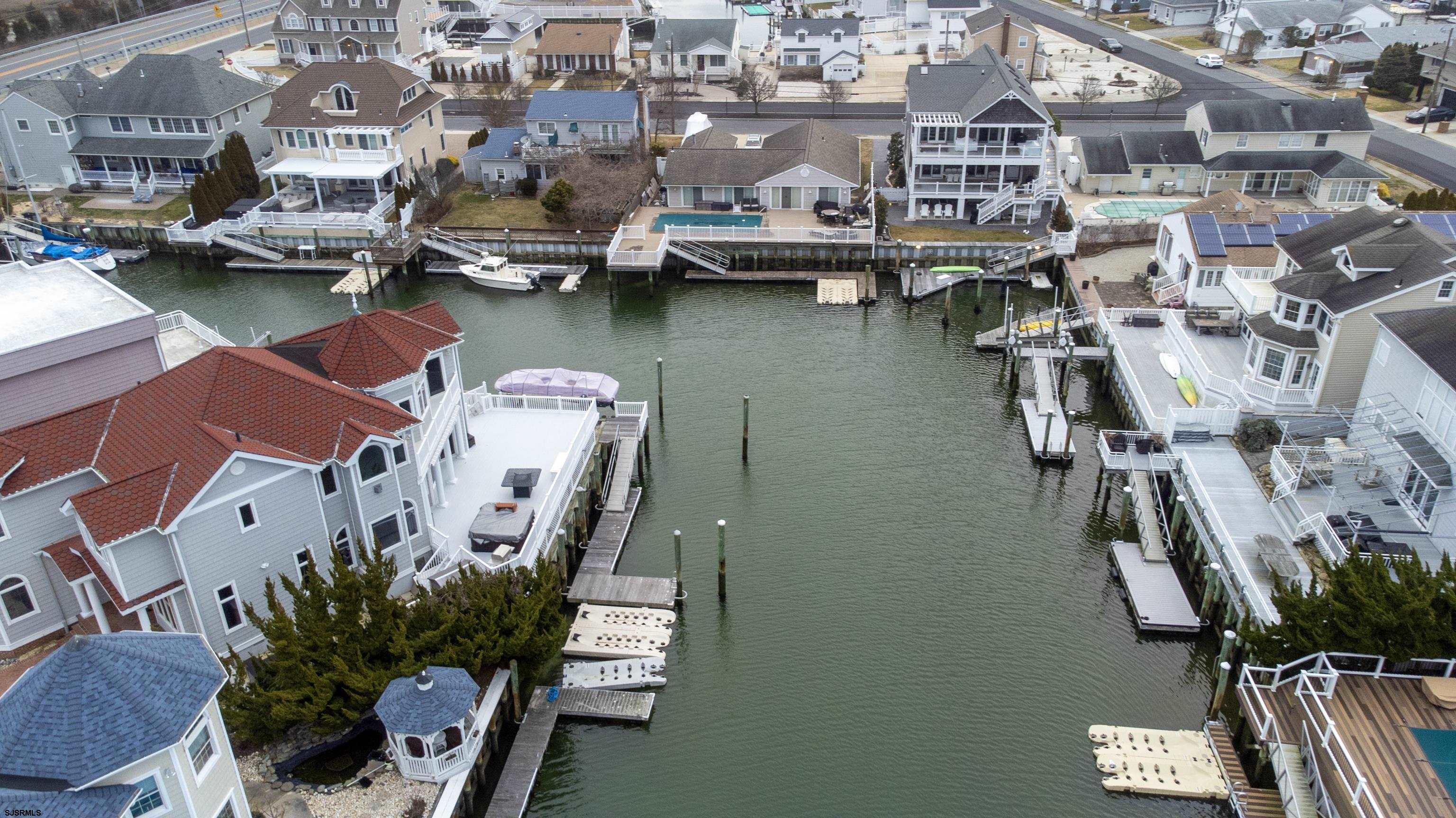 9 Sunset Boulevard Egg Harbor Township, NJ 08403 - Photo 48 of 60 an aerial view of residential houses with outdoor space and lake view