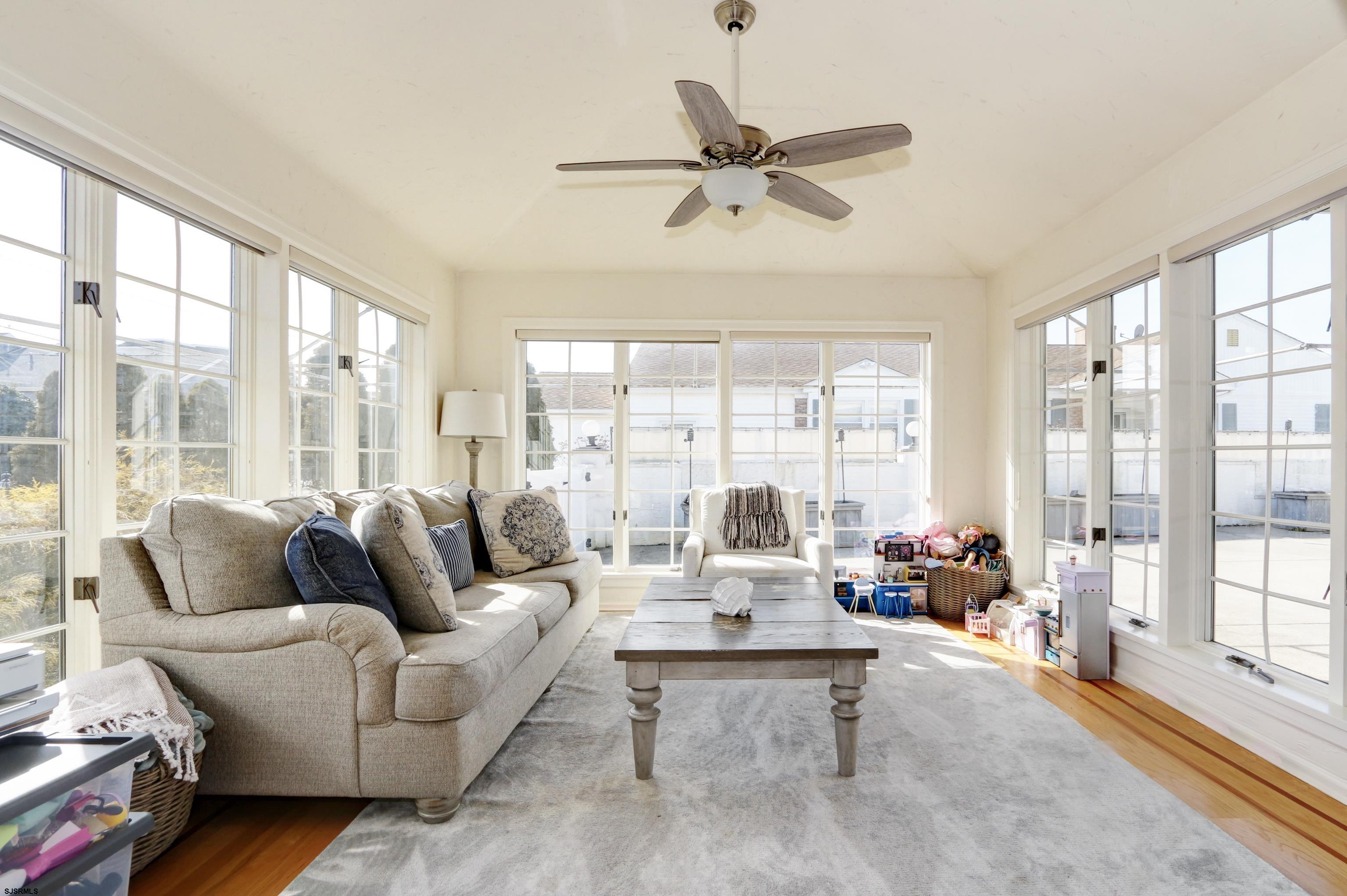 9 Sunset Boulevard Egg Harbor Township, NJ 08403 - Photo 5 of 60 a living room with furniture and a large window