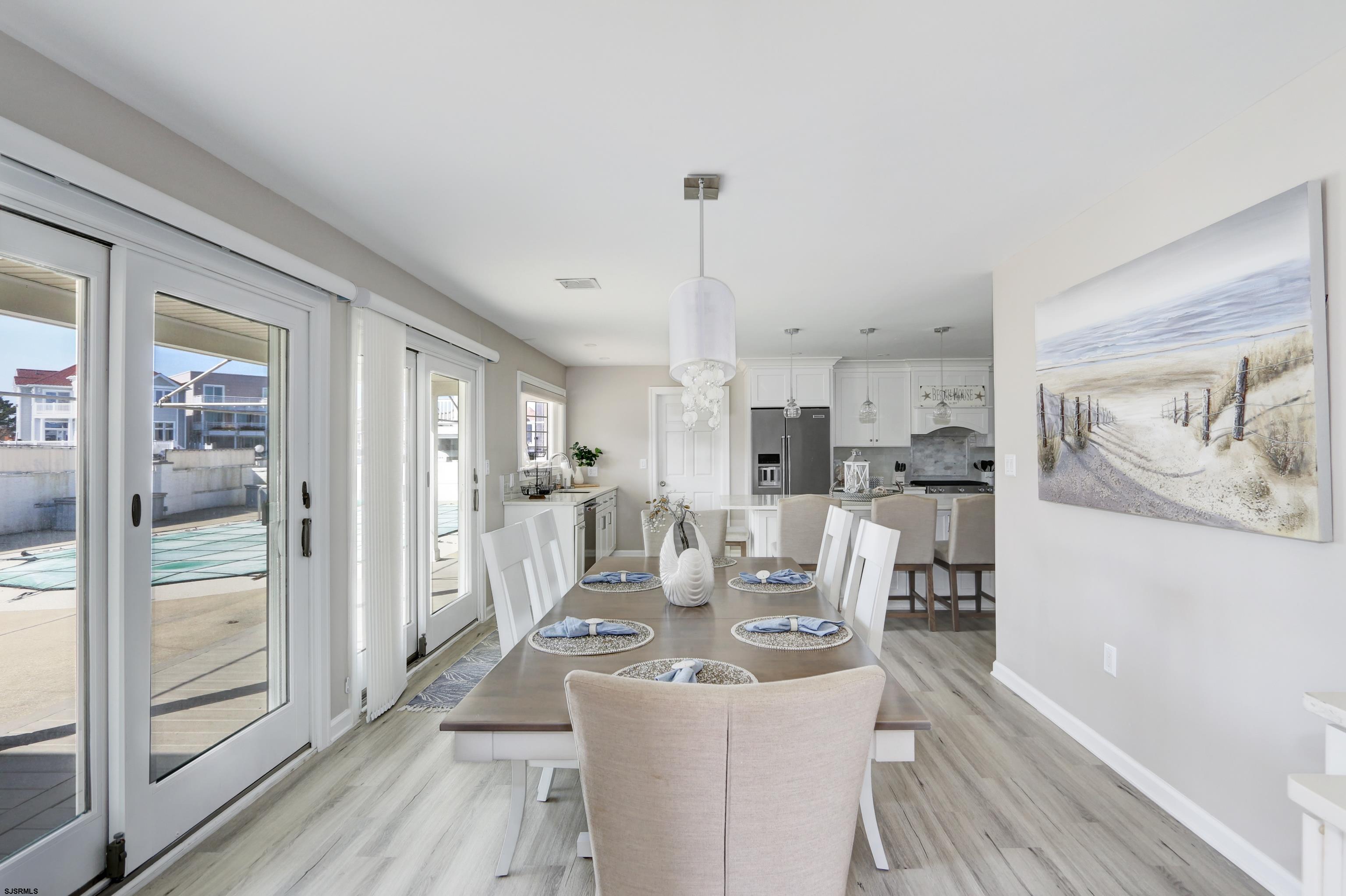 9 Sunset Boulevard Egg Harbor Township, NJ 08403 - Photo 6 of 60 a view of a dining room with furniture window and wooden floor